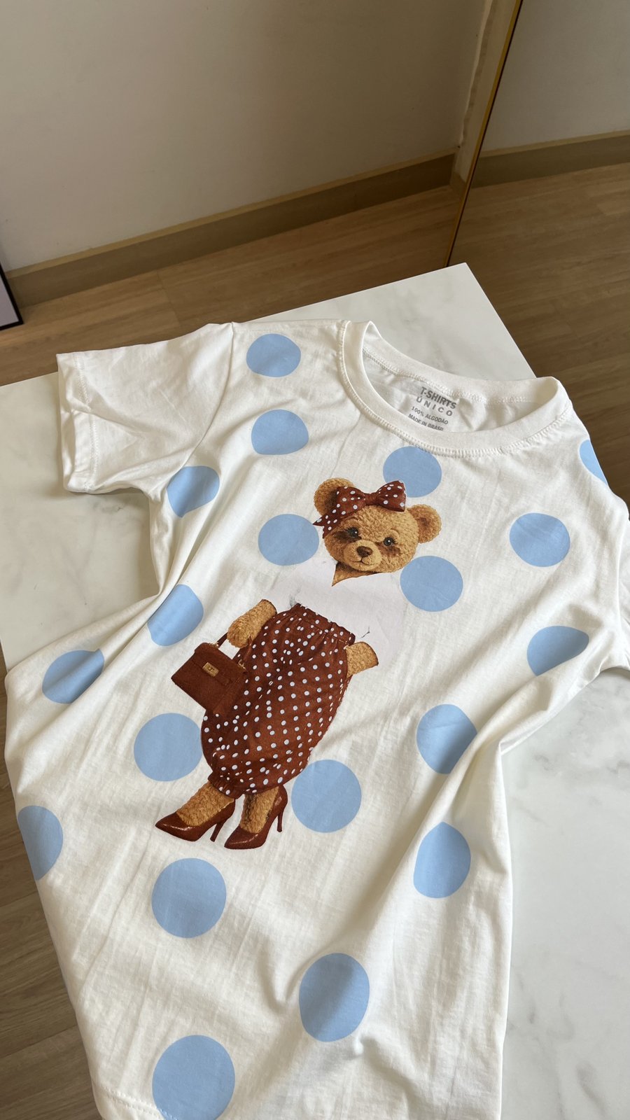 T- Shirts bear em poá